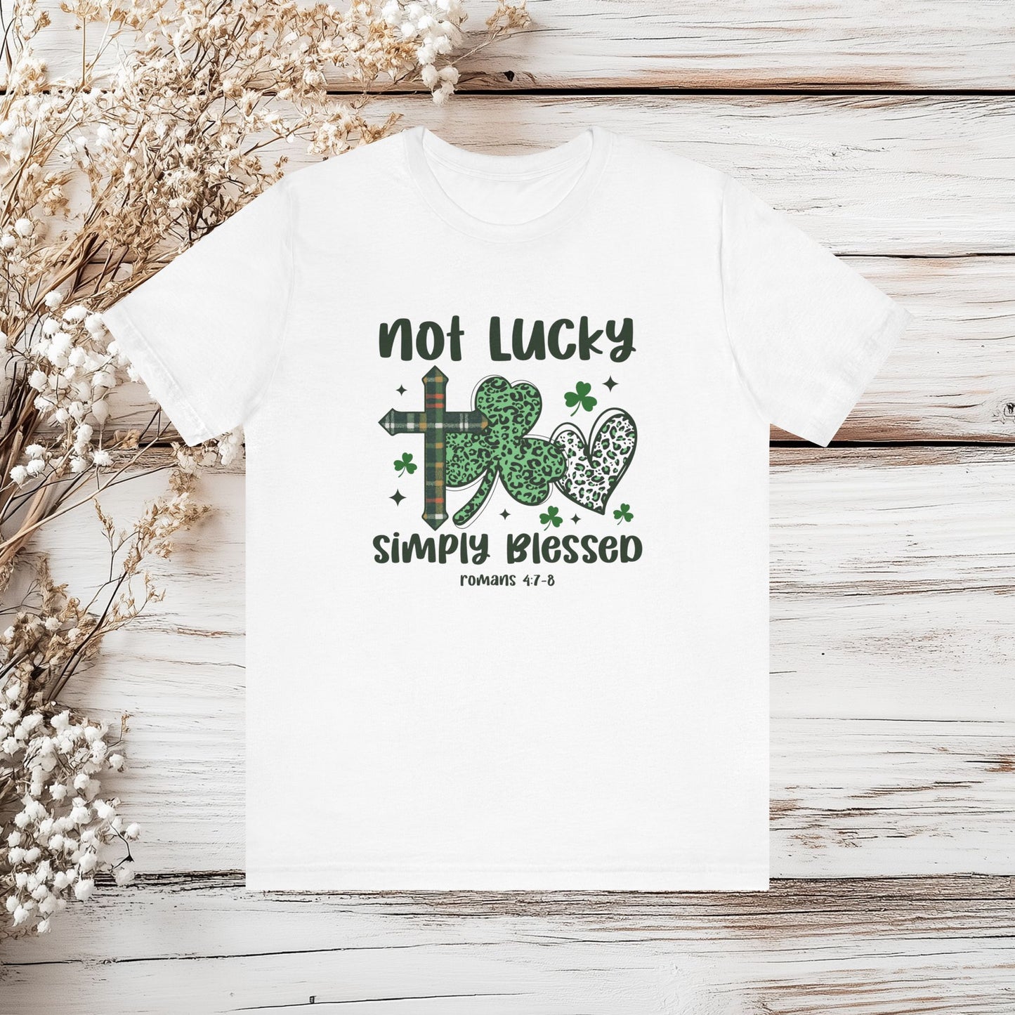 Not Lucky Simply Blessed Christian T-Shirt - St. Patrick's Day Tee with Leopard Shamrock & Cross - Romans 4:7-8 | Unisex Jersey Short Sleeve Tee