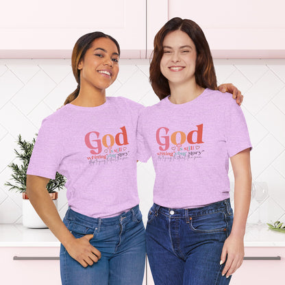 God Is Still Writing Your Story – Inspirational Christian T-Shirt | Unisex Jersey Short Sleeve Tee